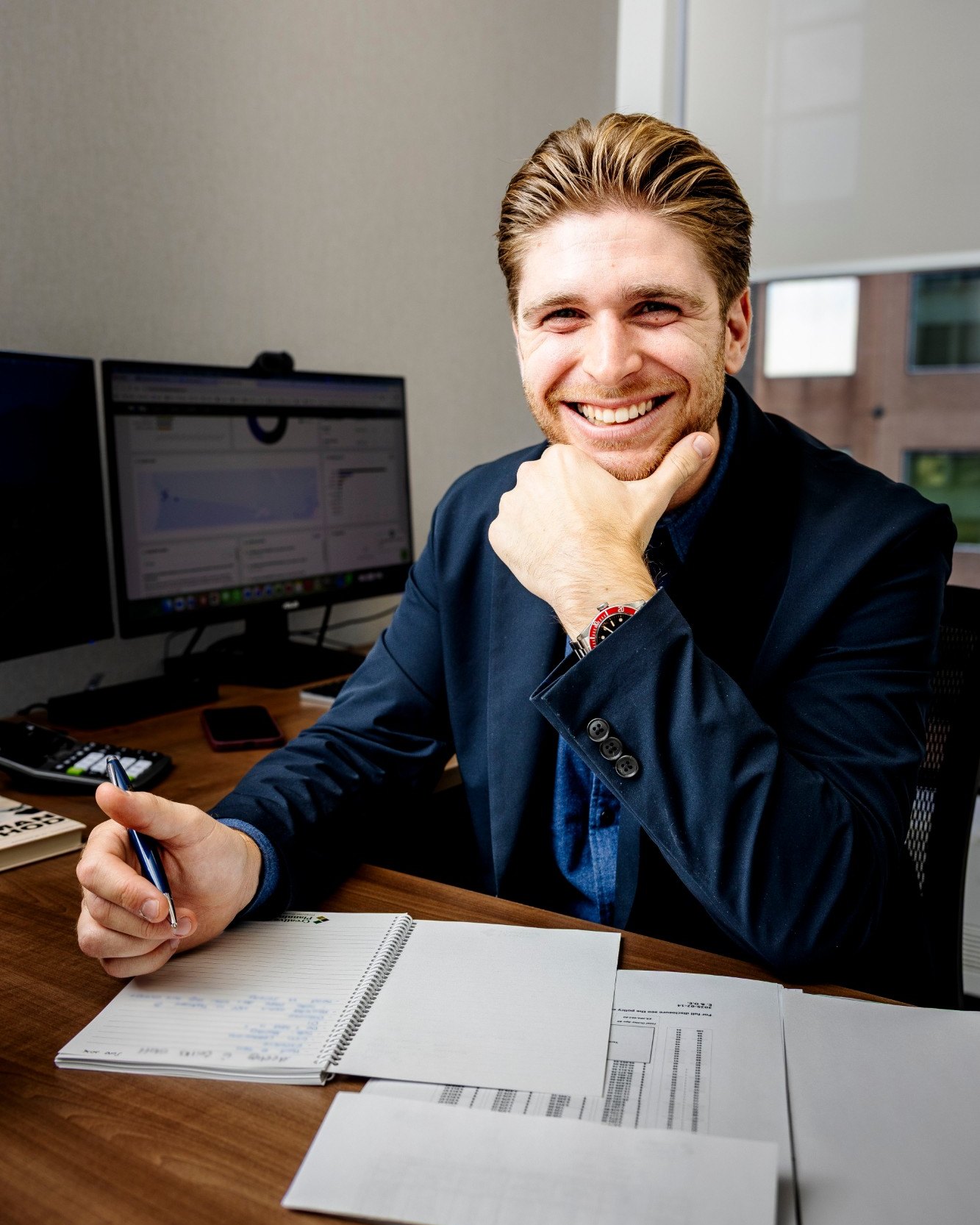 Chase Kalish at his desk at Creative Planning Financial Group